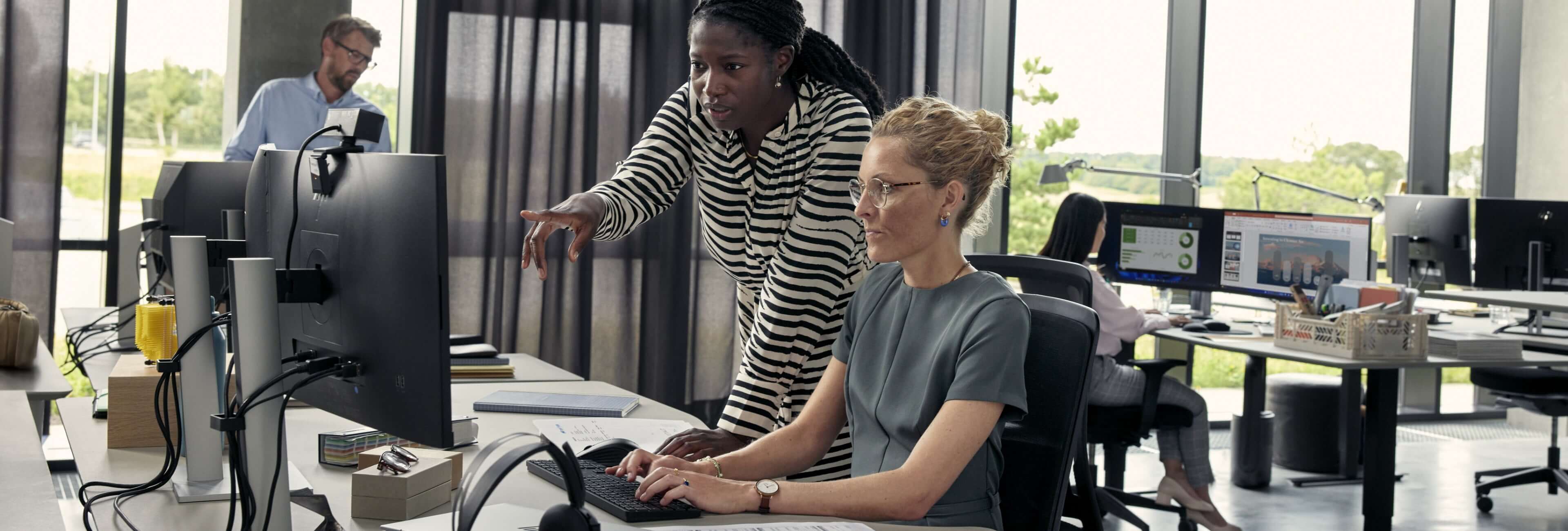 Coworkers working together in an office.