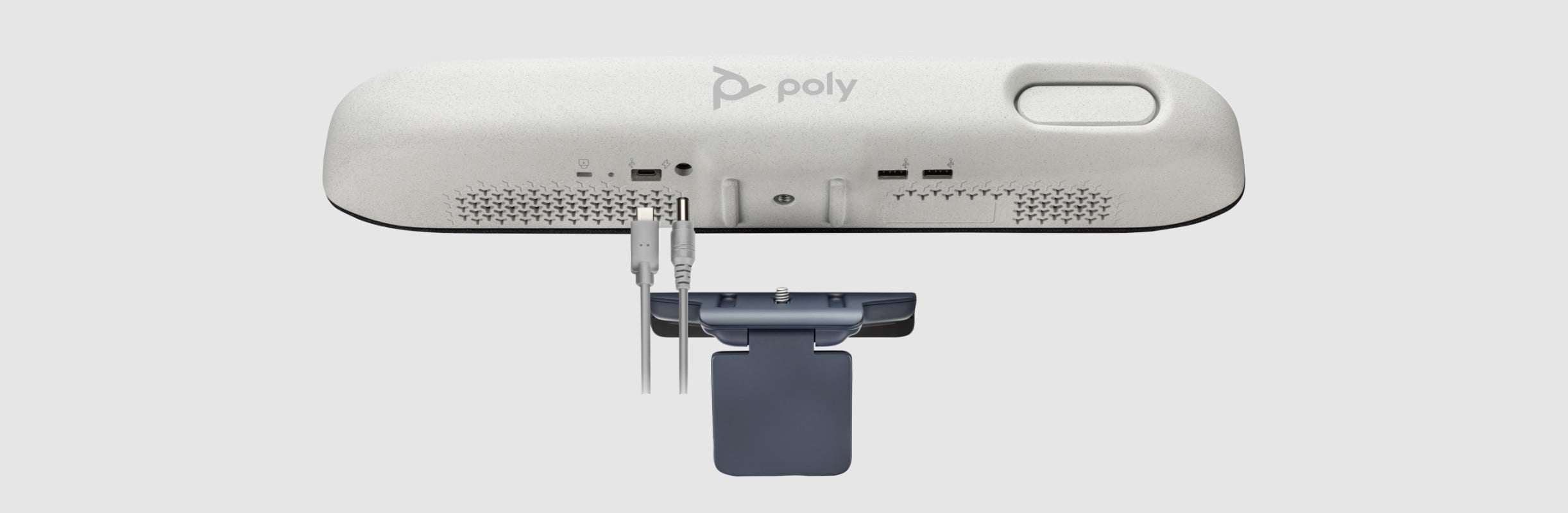 Poly monitor display mounting clamp showing how it connects to underside back of Poly Studio video bar