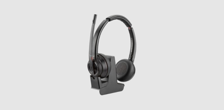 Poly Savi 8220 Office series DECT wireless headset on base stand with multi device connectivity  and volume controls
